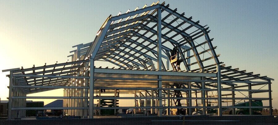 Light gauge steel frame of a building against the evening sky